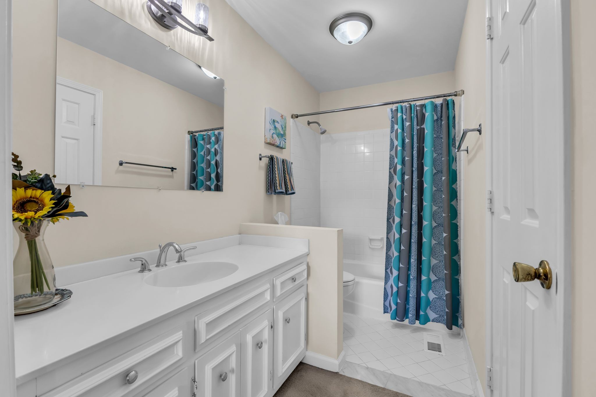 824 General George Patton Road Nashville, TN 37221 - Photo 25 of 35 a bathroom with a double vanity sink and a mirror