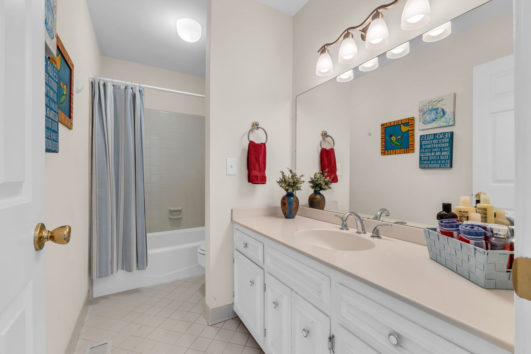 824 General George Patton Road Nashville, TN 37221 - Photo 30 of 35 a bathroom with a sink a vanity and a mirror