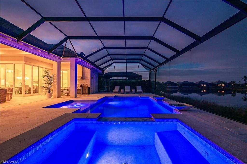 8916 Nevis Way Naples, FL 34112 - Photo 2 of 50 a view of swimming pool with furniture