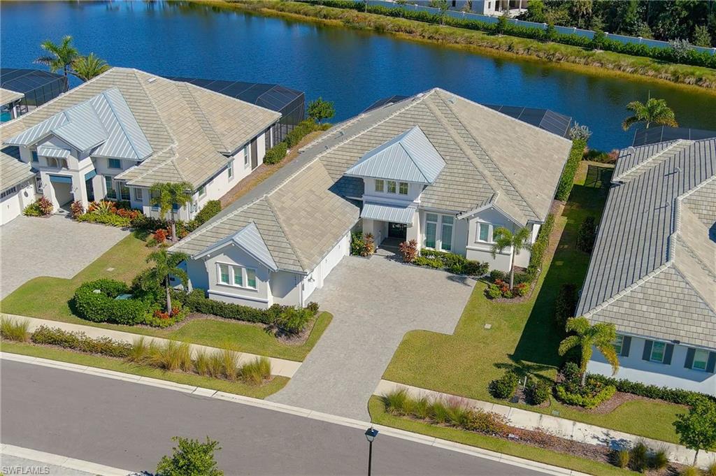 8916 Nevis Way Naples, FL 34112 - Photo 49 of 50 an aerial view of a house with a yard and balcony