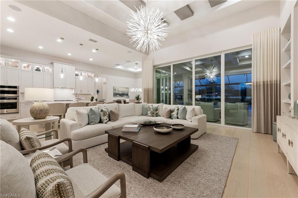 8916 Nevis Way Naples, FL 34112 - Photo 5 of 50 a living room with furniture and a large window