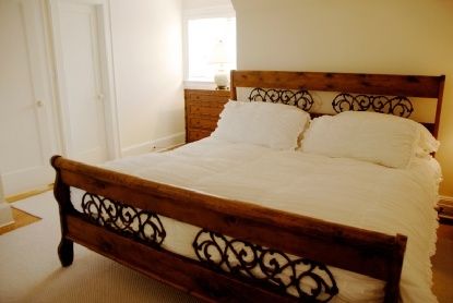 Undisclosed Address Bridgehampton, NY 11976 - Photo 11 of 19 a bedroom with a bed and a dresser