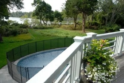 a view of a chair and table on the patio