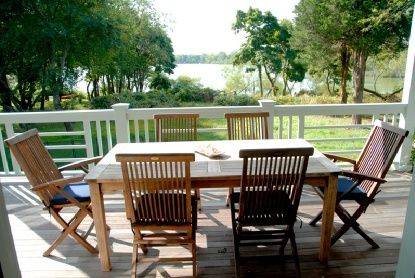 Undisclosed Address Bridgehampton, NY 11976 - Photo 19 of 19 a view of a chair and table on the patio