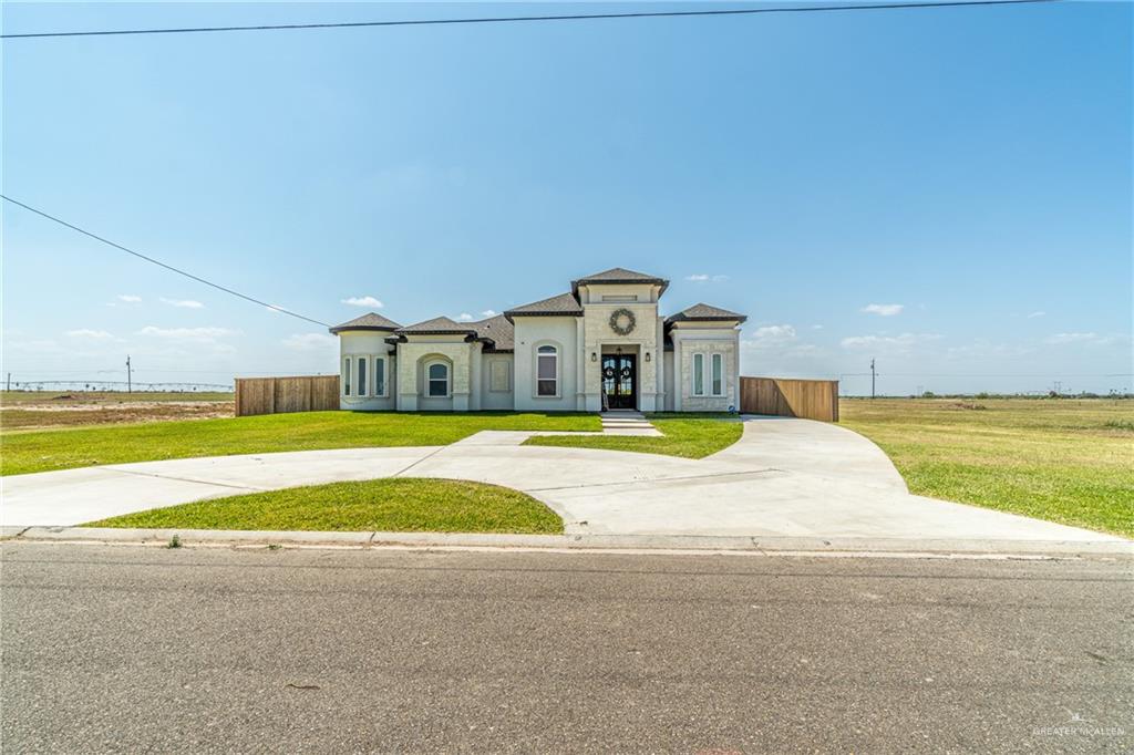 21325 Hibiscus Street Edcouch, TX 78538 - Photo 2 of 17 a view of a swimming pool with an outdoor space and seating area