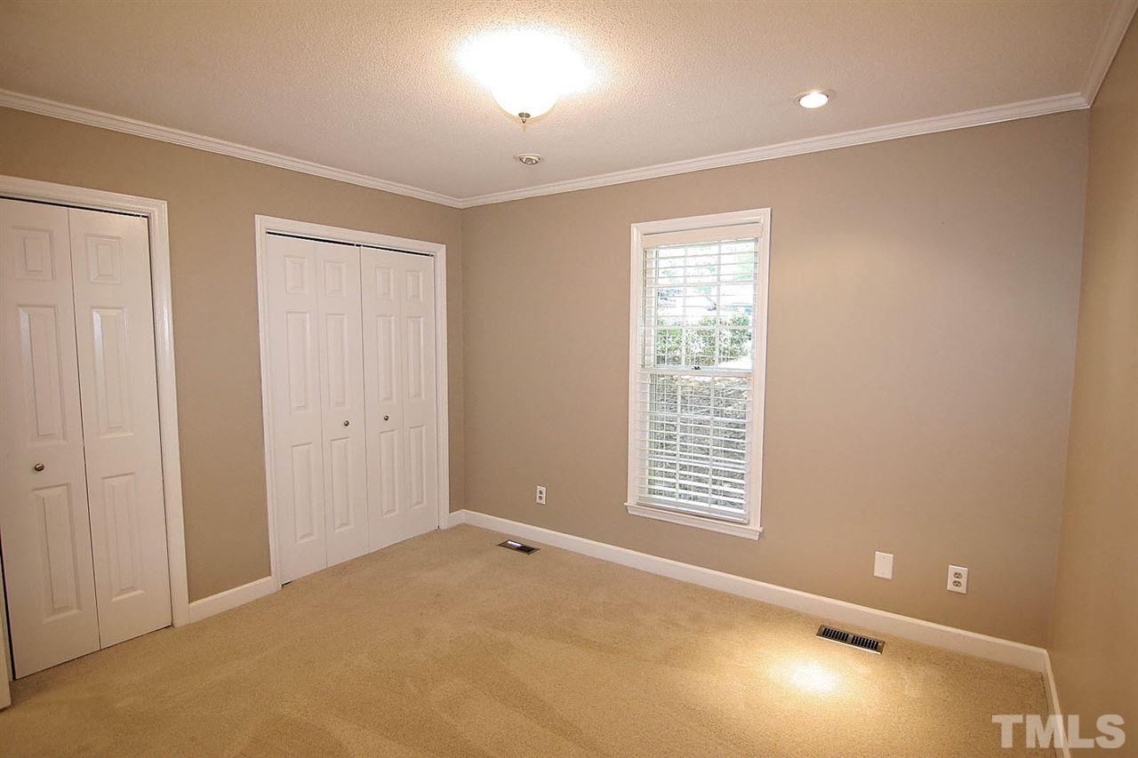 4530 Hamptonshire Drive Raleigh, NC 27613 - Photo 11 of 20 a view of an empty room with a window