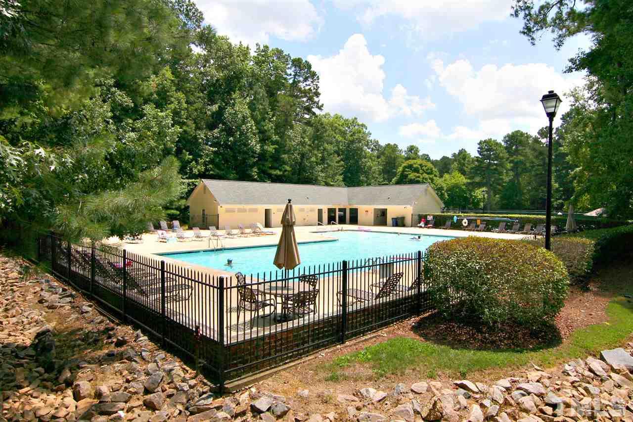 4530 Hamptonshire Drive Raleigh, NC 27613 - Photo 17 of 20 a view of a deck with a yard