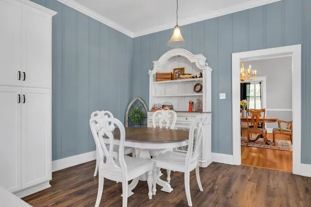 a kitchen with stainless steel appliances a stove sink and microwave
