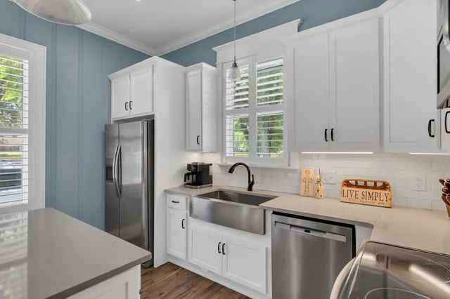 a bedroom with a bed and a fireplace