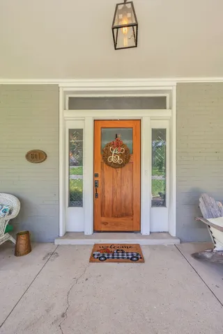 a room with gym equipment and a large window