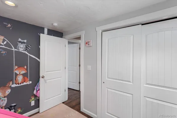 a bed room with a bed and a couch