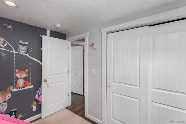 a bed room with a bed and a couch