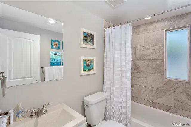 a living room with furniture and decor