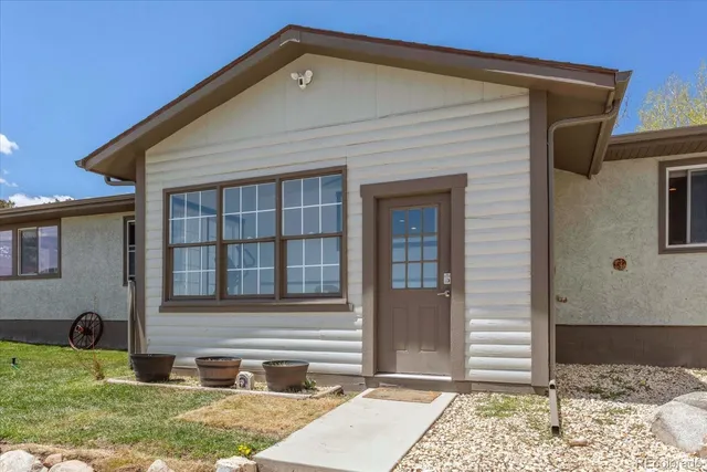 a house view with a garden space