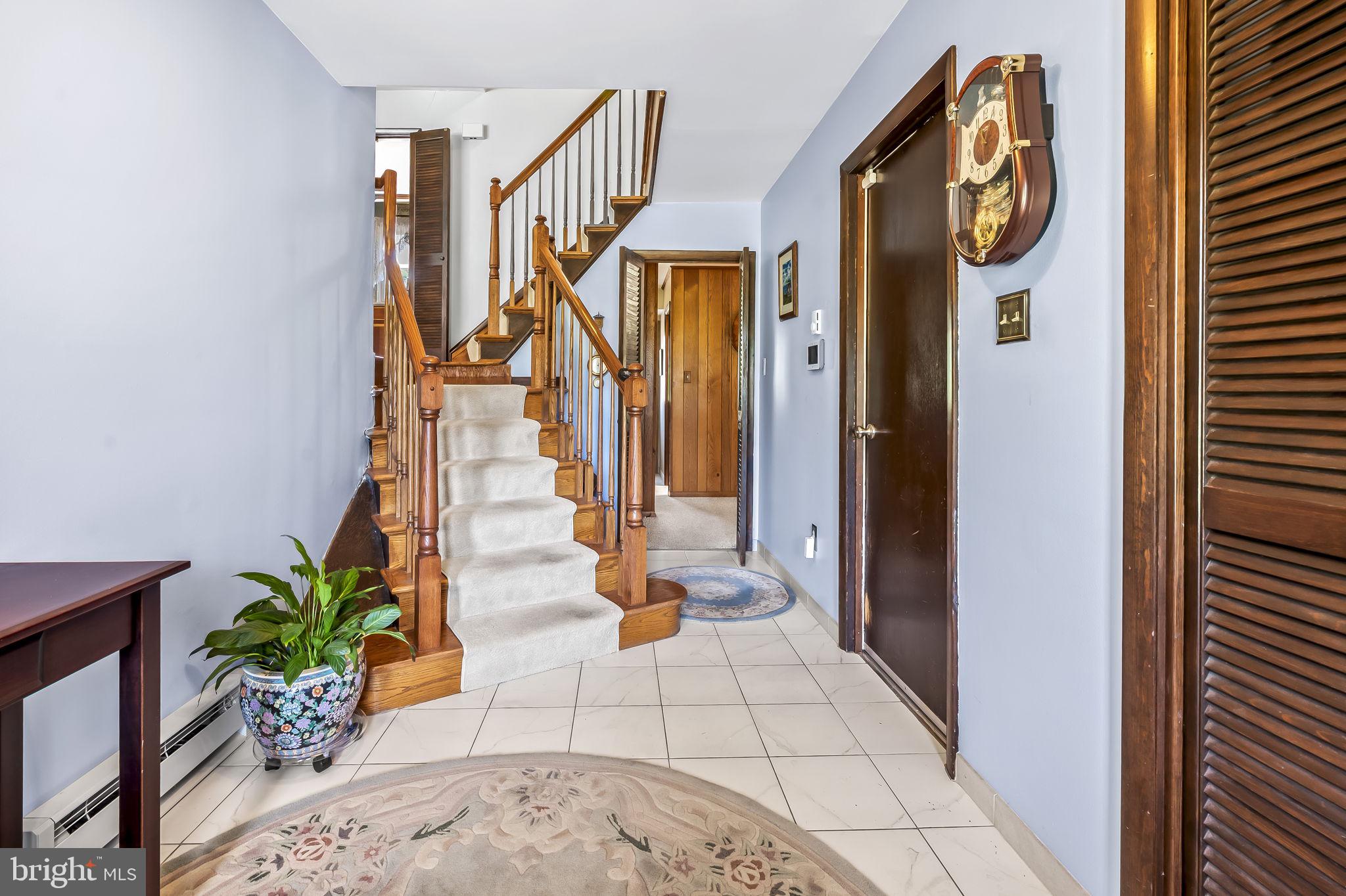 12913 Gent Road Reisterstown, MD 21136 - Photo 15 of 39 Entrance Hall w/coat closet & door to gar