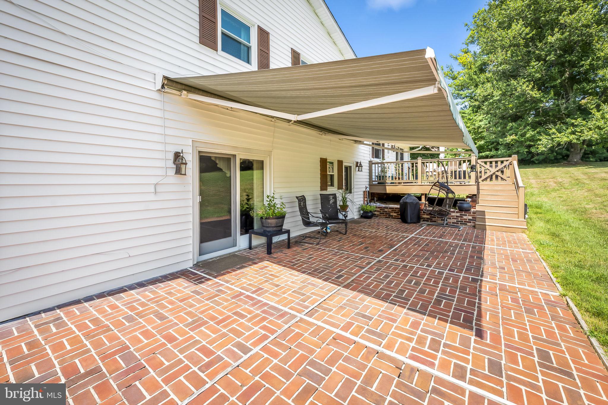 12913 Gent Road Reisterstown, MD 21136 - Photo 29 of 39 Brick Patio w/retractable awning