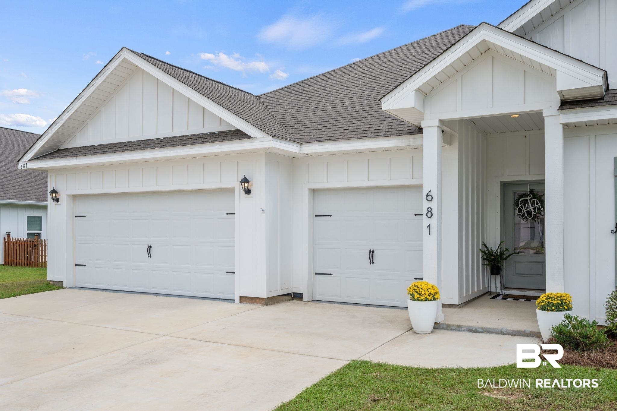 681 Calibre Street Fairhope, AL 36532 - Photo 4 of 56 View of front of property with a garage