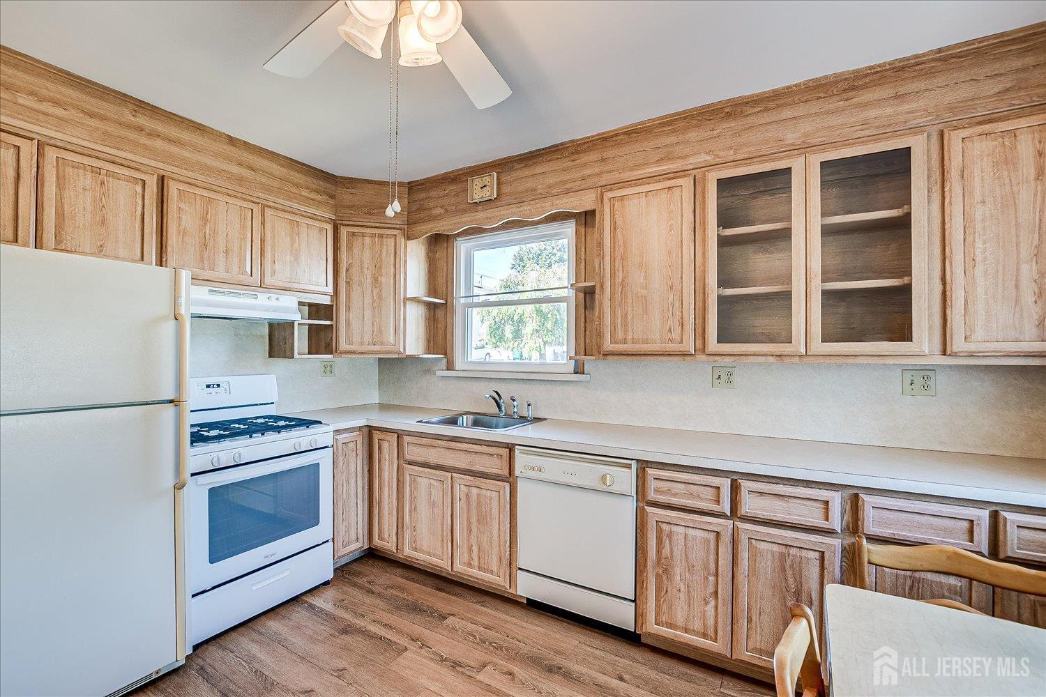 92 Lake View Boulevard Edison, NJ 08817 - Photo 15 of 39 a kitchen with stainless steel appliances granite countertop a sink and cabinets