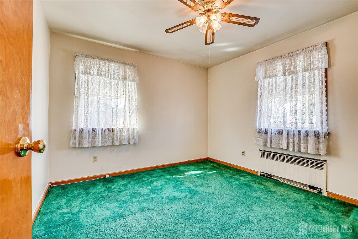 92 Lake View Boulevard Edison, NJ 08817 - Photo 20 of 39 a view of an empty room with a window