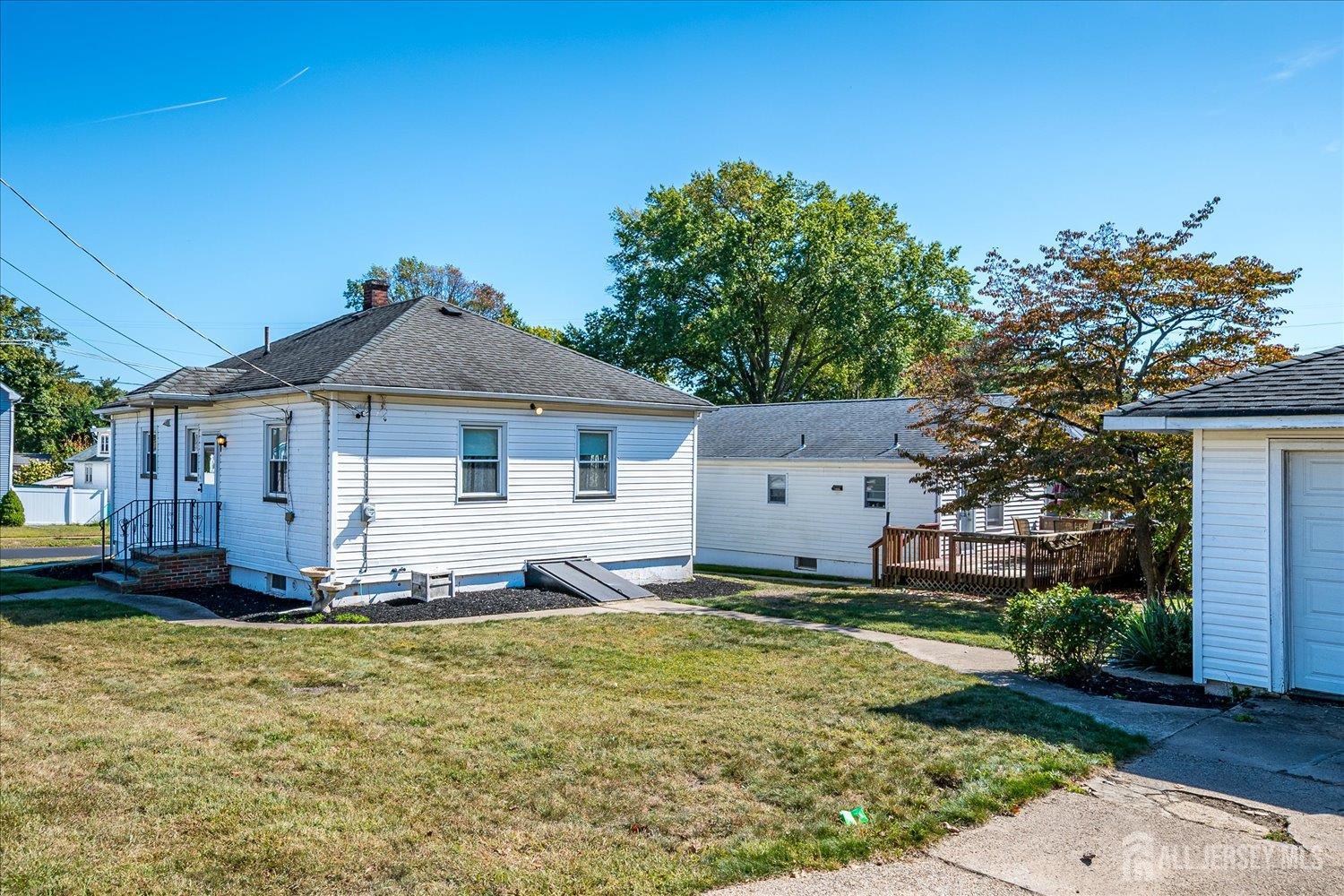 92 Lake View Boulevard Edison, NJ 08817 - Photo 24 of 39 a front view of a house with a yard