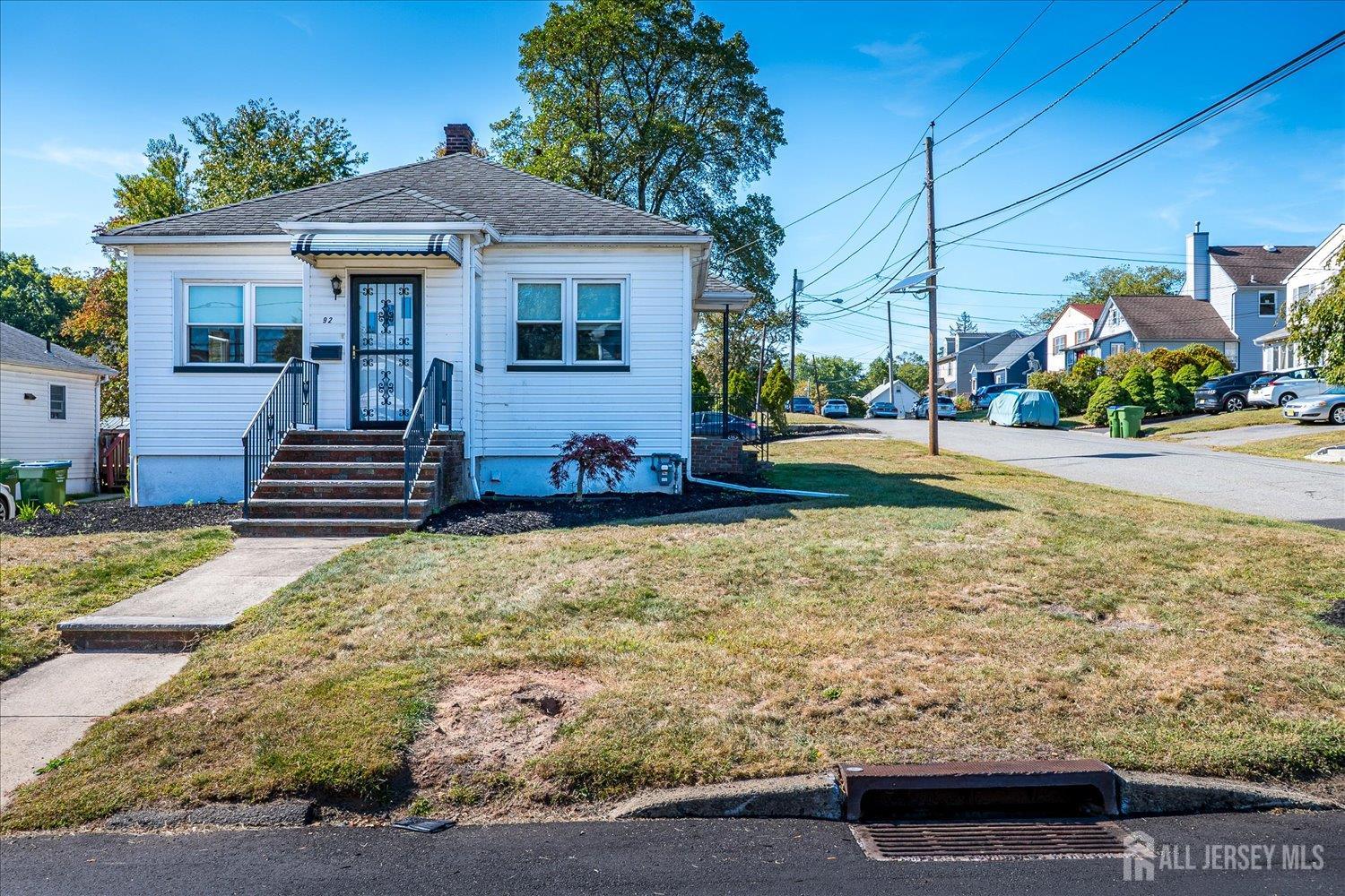 92 Lake View Boulevard Edison, NJ 08817 - Photo 6 of 39 a front view of a house with a yard