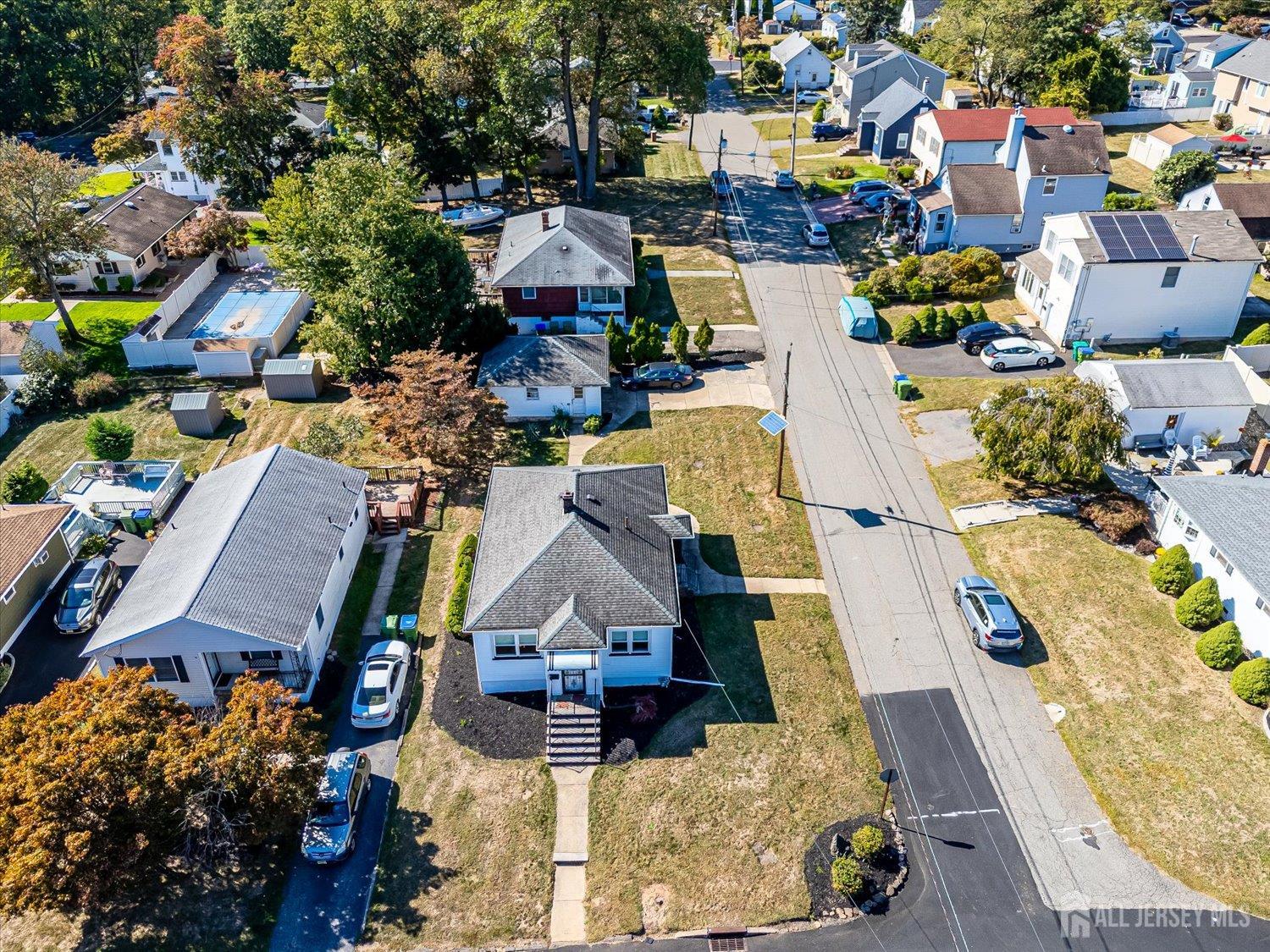 92 Lake View Boulevard Edison, NJ 08817 - Photo 7 of 39 an aerial view of a houses with a swimming pool