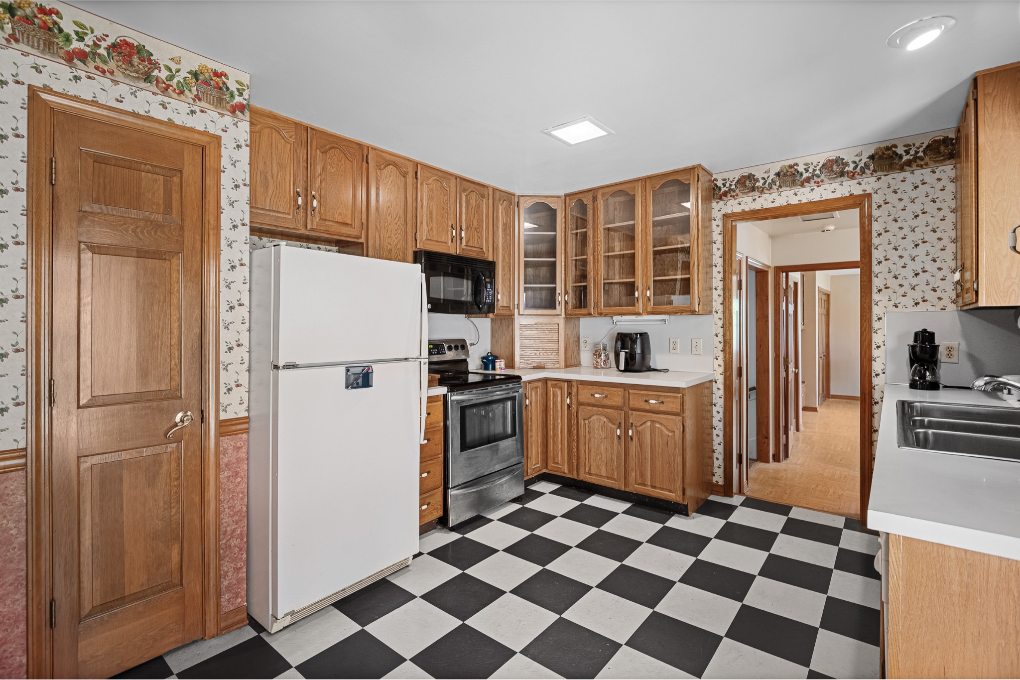 2159 Verona Caney Road Lewisburg, TN 37091 - Photo 14 of 41 a kitchen with a refrigerator a sink and dishwasher