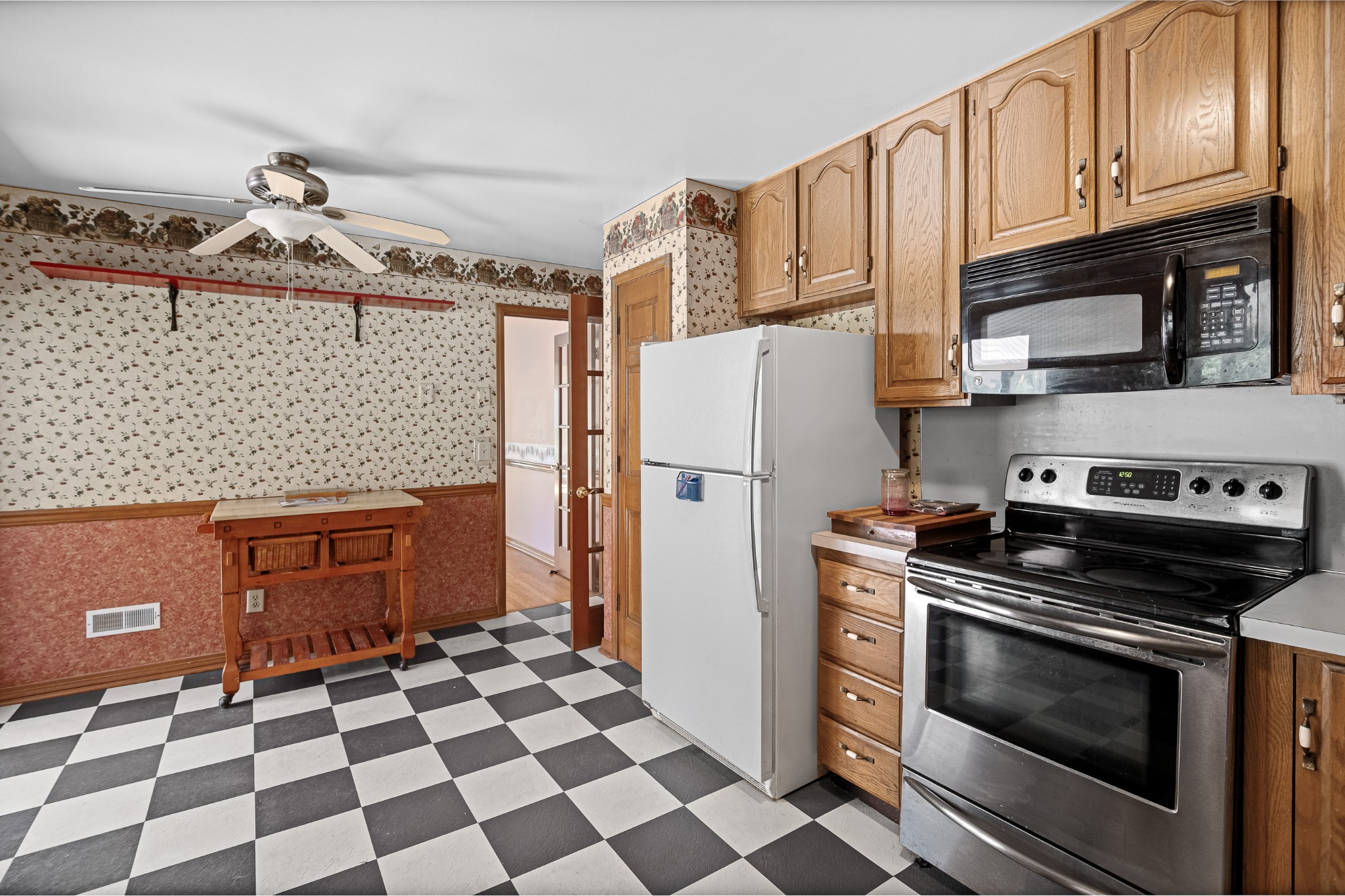 2159 Verona Caney Road Lewisburg, TN 37091 - Photo 15 of 41 a kitchen with stainless steel appliances granite countertop a refrigerator and a stove top oven