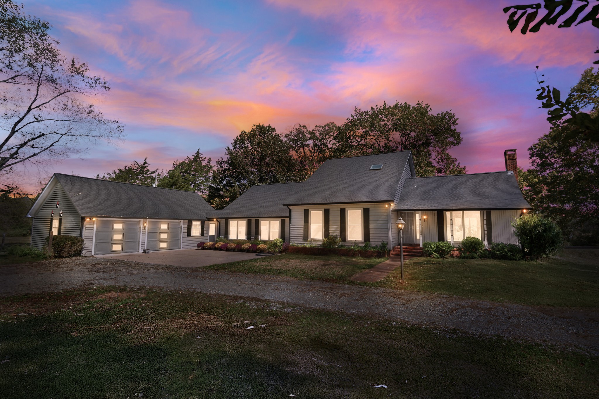 2159 Verona Caney Road Lewisburg, TN 37091 - Photo 2 of 41 a front view of a house with a garden and yard