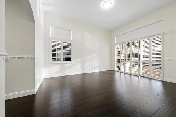 a view of gallery with wooden floor