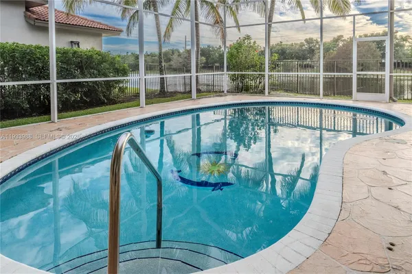 a view of a house with a swimming pool