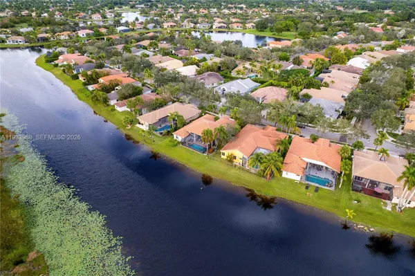 an aerial view of a houses with outdoor space