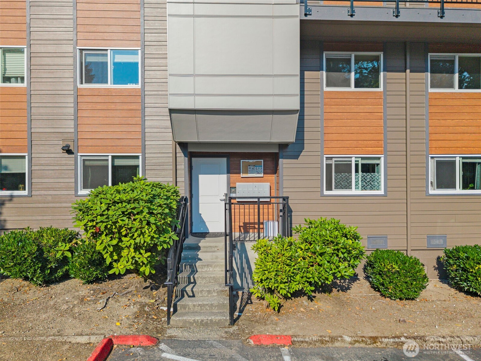 210 Southwest Clark Street, Unit A202 Issaquah, WA 98027 - Photo 1 of 28 front view of a house