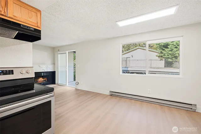 a view of an empty room with a window