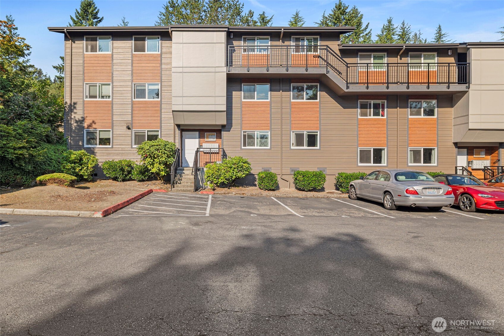 210 Southwest Clark Street, Unit A202 Issaquah, WA 98027 - Photo 23 of 28 a view of a car park in front of house