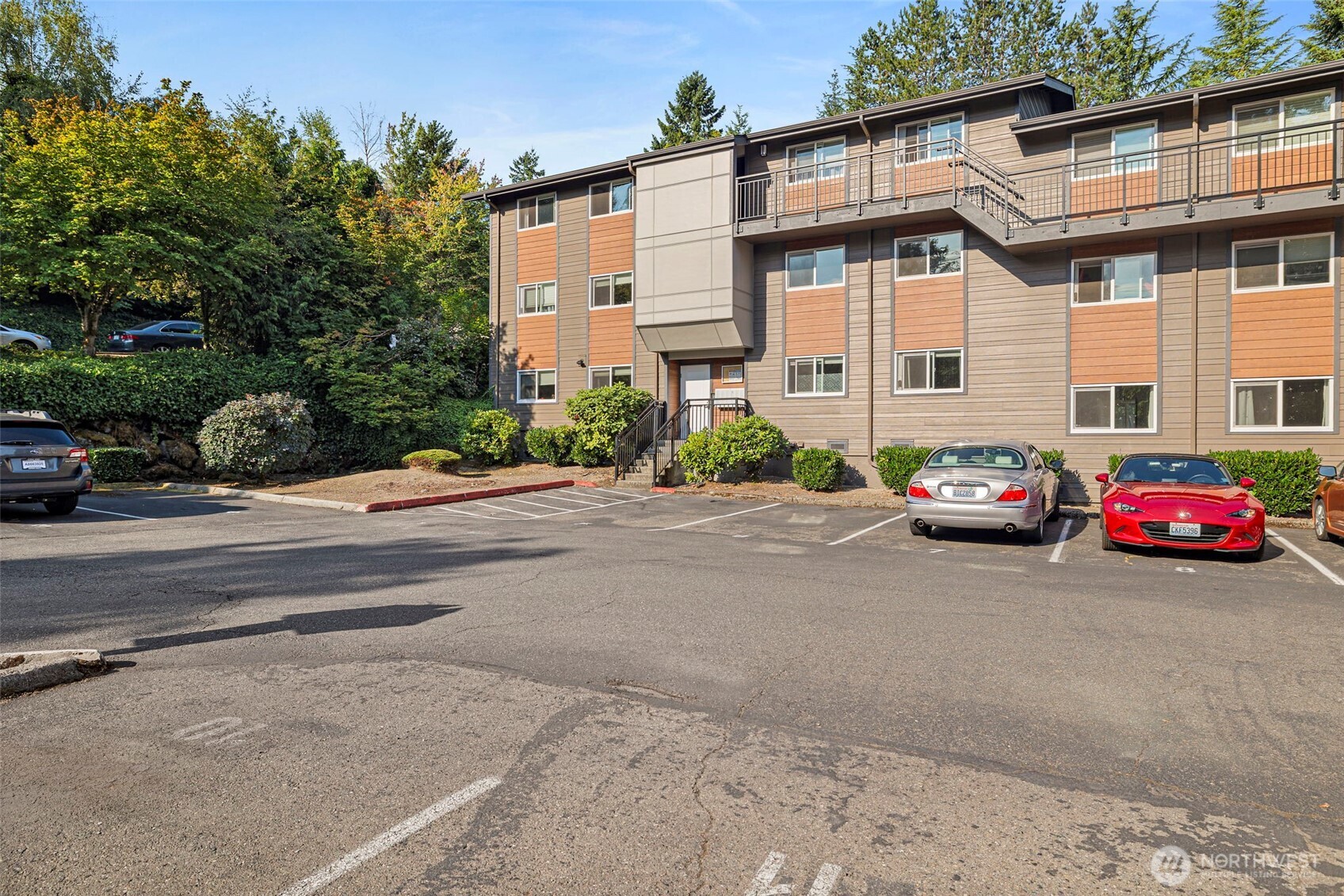 210 Southwest Clark Street, Unit A202 Issaquah, WA 98027 - Photo 24 of 28 a car parked in front of a house