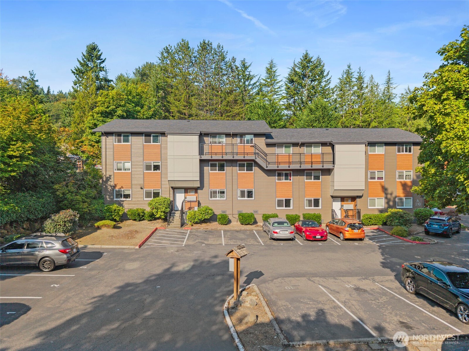 210 Southwest Clark Street, Unit A202 Issaquah, WA 98027 - Photo 25 of 28 a car parked in front of a house