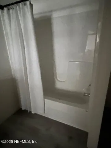 a view of a yard with an outdoor space