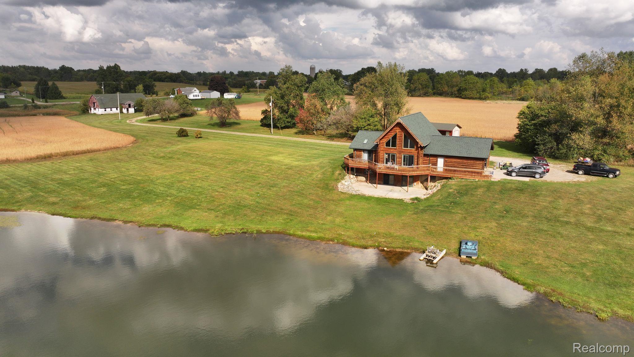 10374 Wilson Road Otisville, MI 48463 - Photo 94 of 99 Aerial view of sparsely populated area with a large body of water