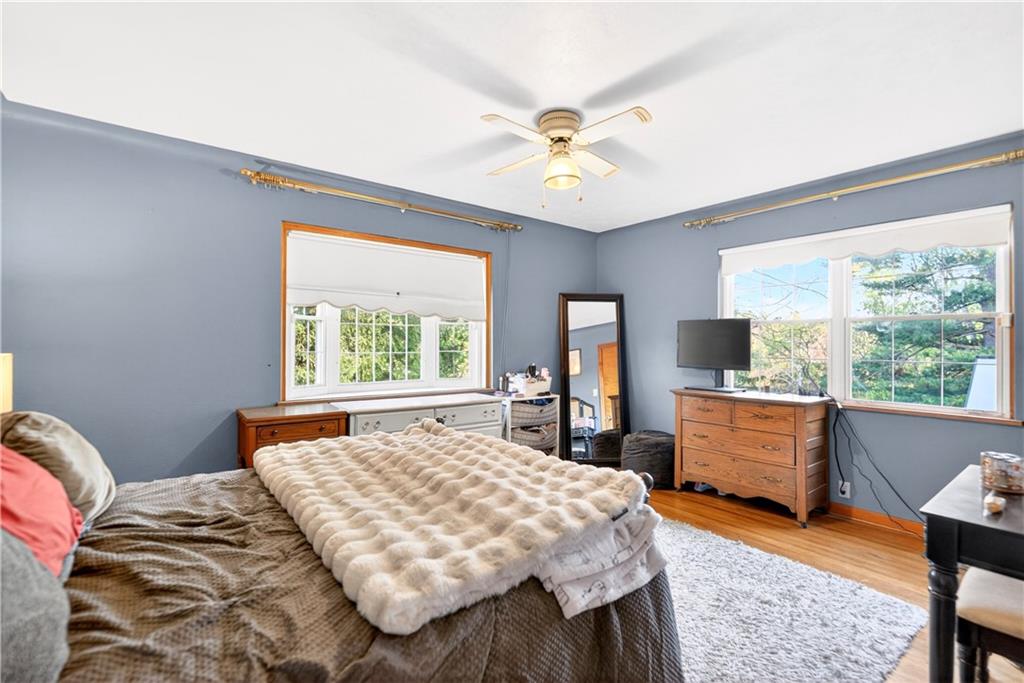 1188 Willowbrook Road Belle Vernon, PA 15012 - Photo 41 of 50 a bedroom with a bed and a table