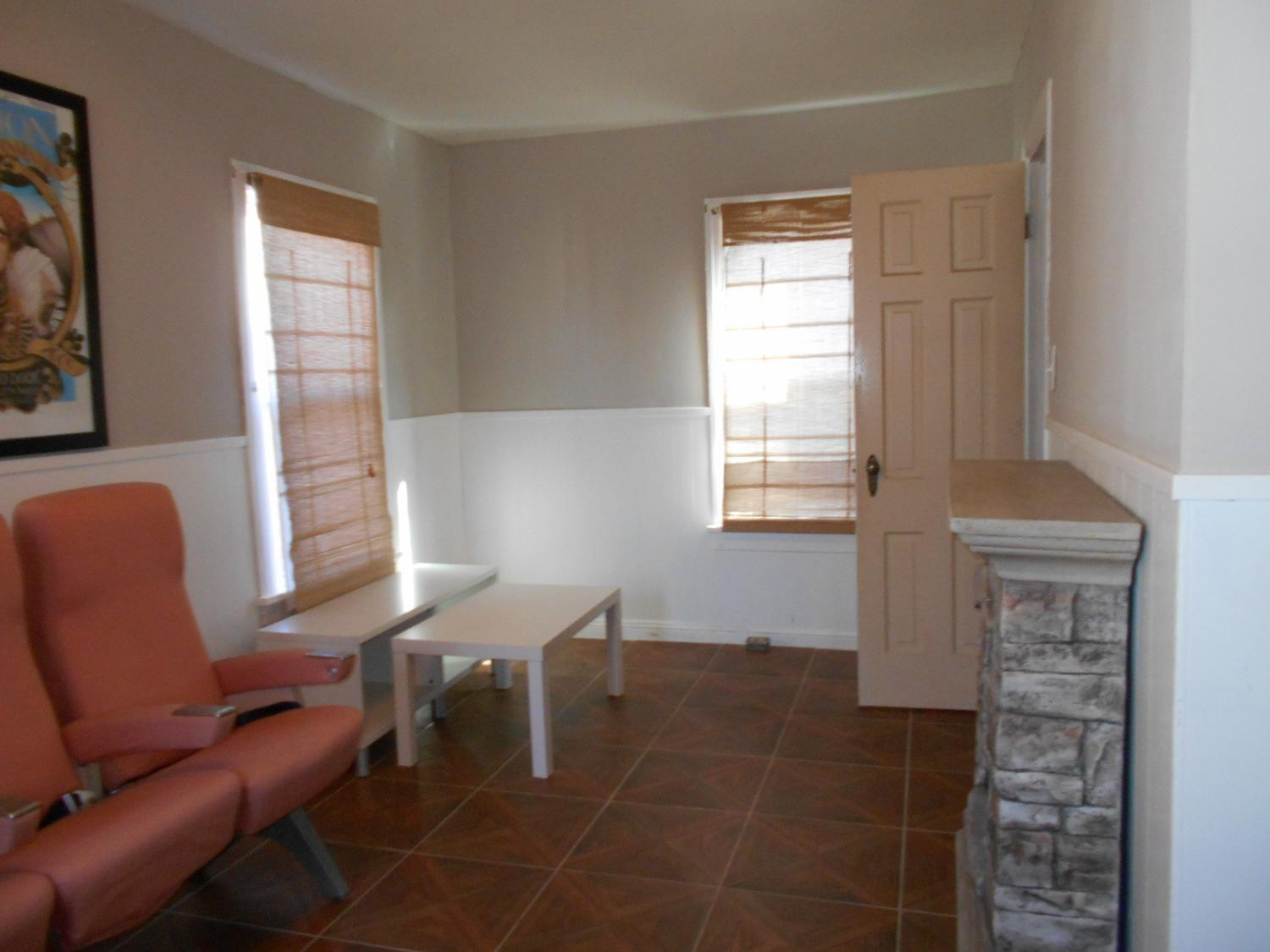 2518 25th Street Lubbock, TX 79410 - Photo 7 of 39 a dining room with furniture and a window