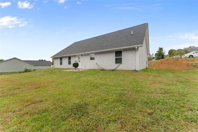 a house view with a garden space