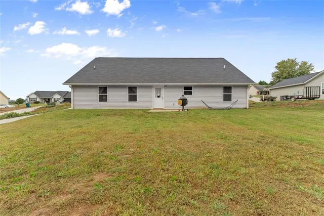 a house view with a garden space