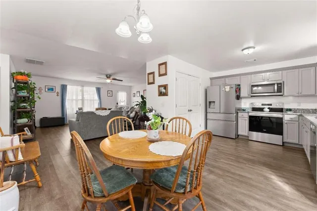 a view of a dining room with furniture