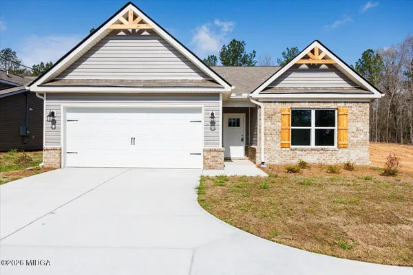 a view of small white house