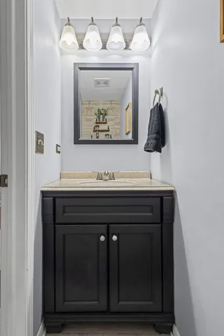 a close view of a dresser with wooden floor