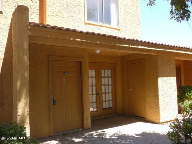 3511 East Baseline Road, Unit 1012 Phoenix, AZ 85042 - Photo 1 of 4 a view of balcony and bedroom