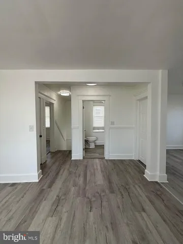 wooden floor in an empty room and window