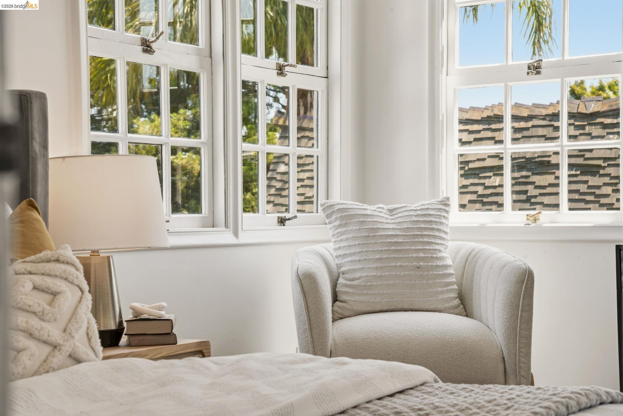 1087 Hubert Road Oakland, CA 94610 - Photo 28 of 67 Bright white interior with multiple grid-paned windows
