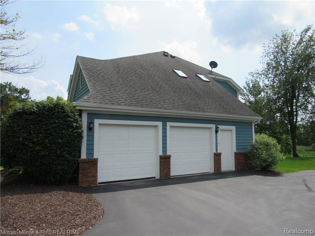5476 Ridge Trail North Clarkston, MI 48348 - Photo 37 of 47 Oversized two & half car garage